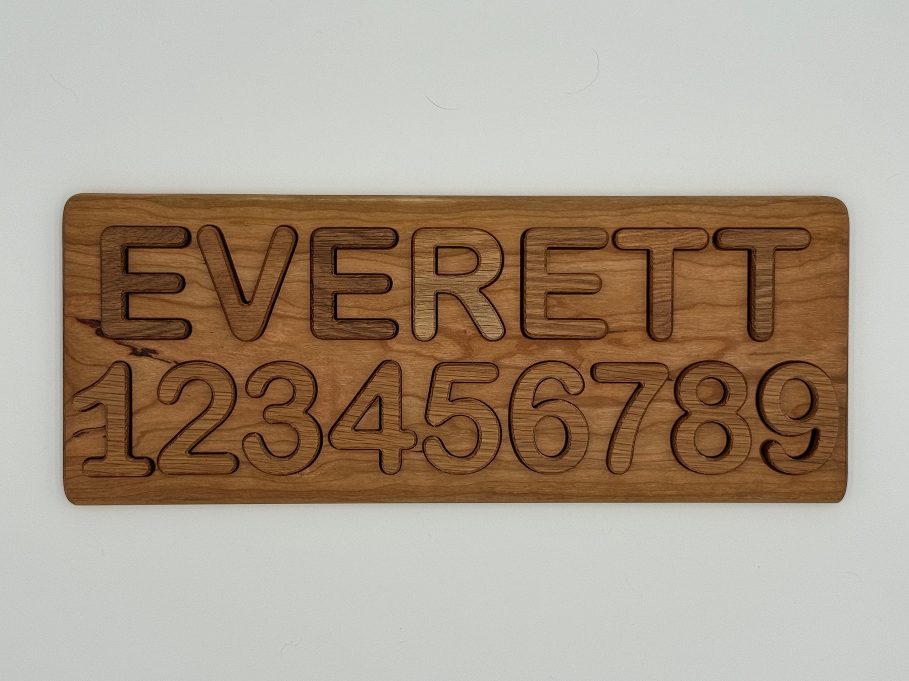 Finished two-row EVERETT name and numbers 1 through 9 puzzle