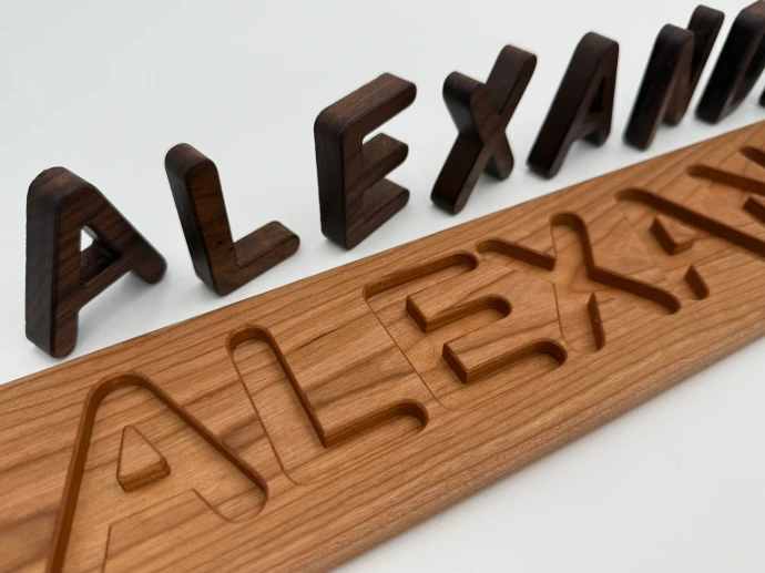 American Cherry board with Walnut letters — detail