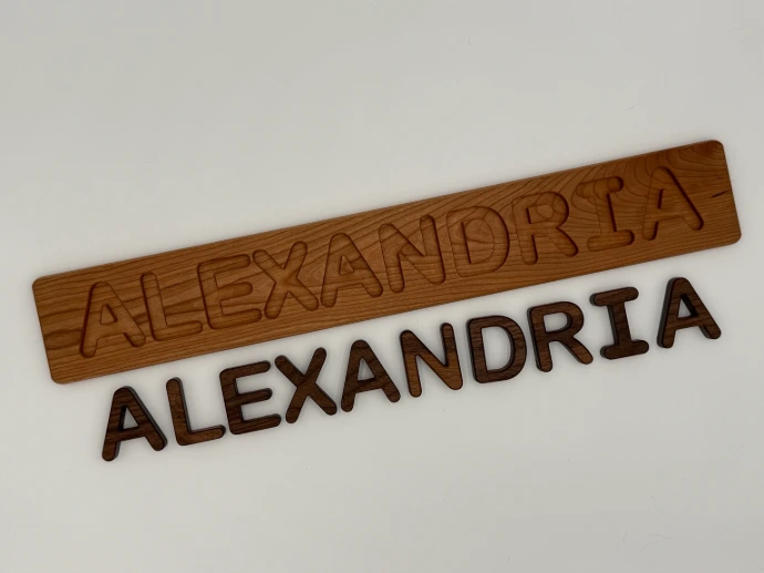 Alexandria personalized puzzle with an American Cherry board and Walnut letters